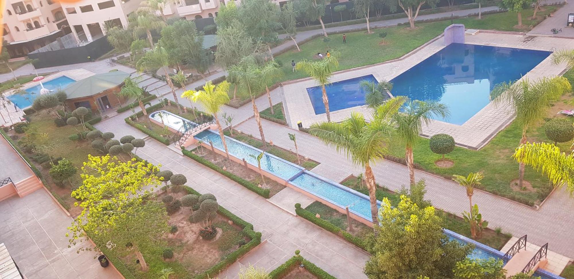 Un Moderne Chic Appartement Vue Sur Piscine Marraquexe Exterior foto