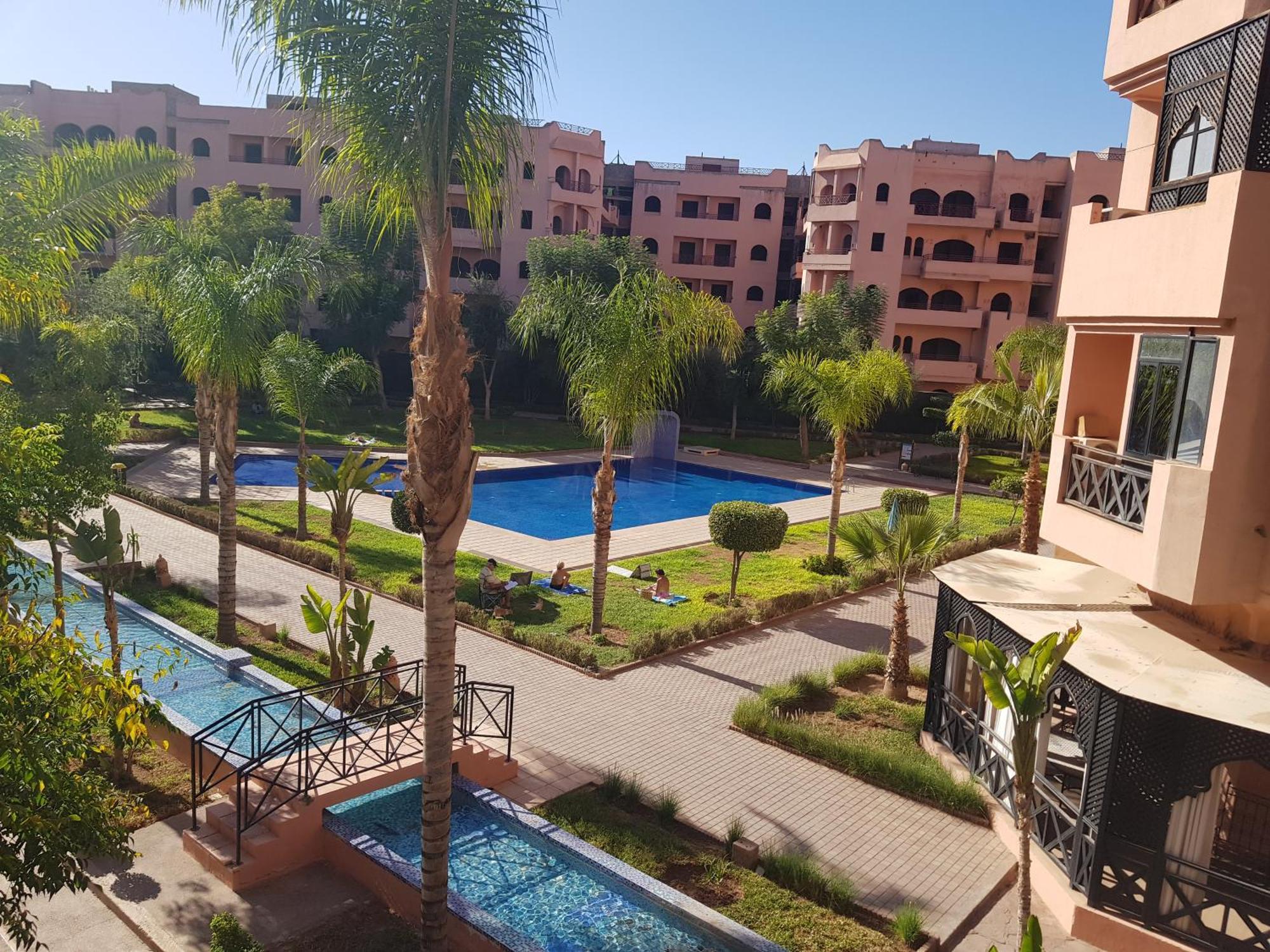 Un Moderne Chic Appartement Vue Sur Piscine Marraquexe Exterior foto
