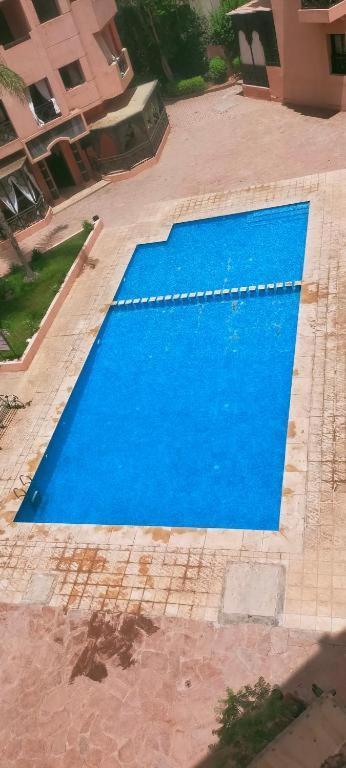 Un Moderne Chic Appartement Vue Sur Piscine Marraquexe Exterior foto